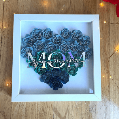 floral shadow box with childrens names on it, for mothers day. 